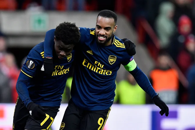 Francoski napadalec Alexandre Lacazette (desno) je eden ključnih adutov Arsenala. FOTO: AFP