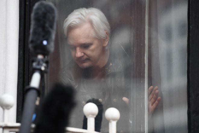 Julianu Assangeu je Ekvador v azilnem postopku dodelil ekvadorsko osebno številko. FOTO: Justin Tallis/AFP