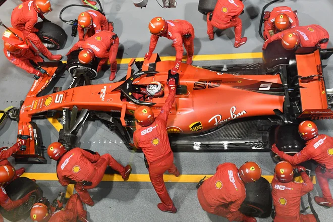 Sebastian Vettel je po sušnih 392 dneh spet slavil zmago. FOTO: AFP