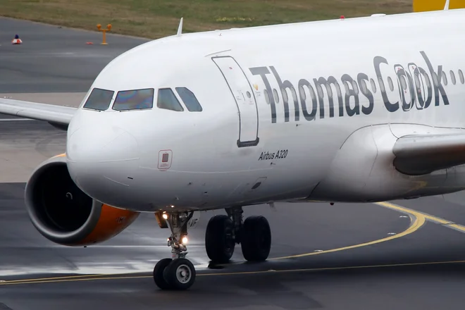 Najstarejša svetovna potovalna agencija Thomas Cook je v stečaju. FOTO: Wolfgang Rattay/Reuters
