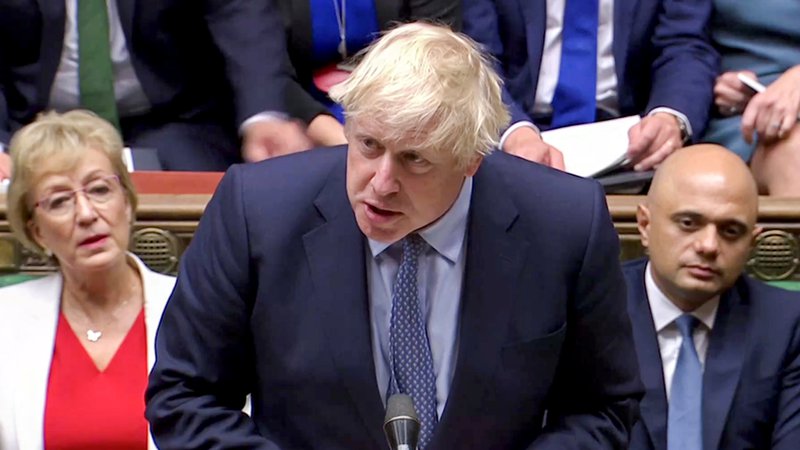 Fotografija: »Želijo spremeniti vlado, naj imajo volitve,« je v parlamentu izjavil Boris Johnson. FOTO: Reuters