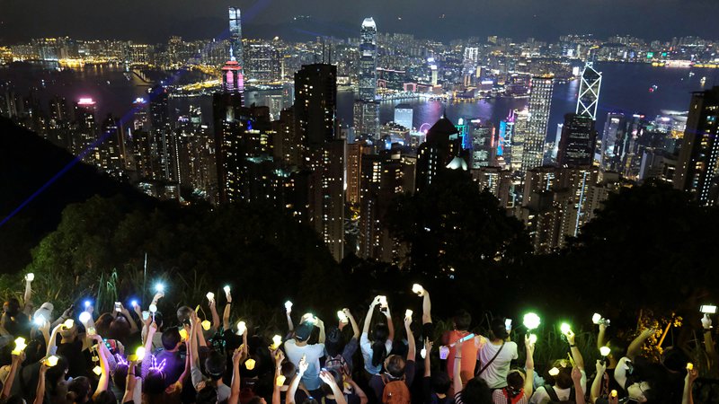 Fotografija: Od leta 2008 je Hongkong pri merjenju državljanskih svoboščin padel s 17. na 32. mesto med 162 državami in ozemlji, Kitajska pa z 129. na 141. mesto. FOTO: Tyrone Siu/Reuters