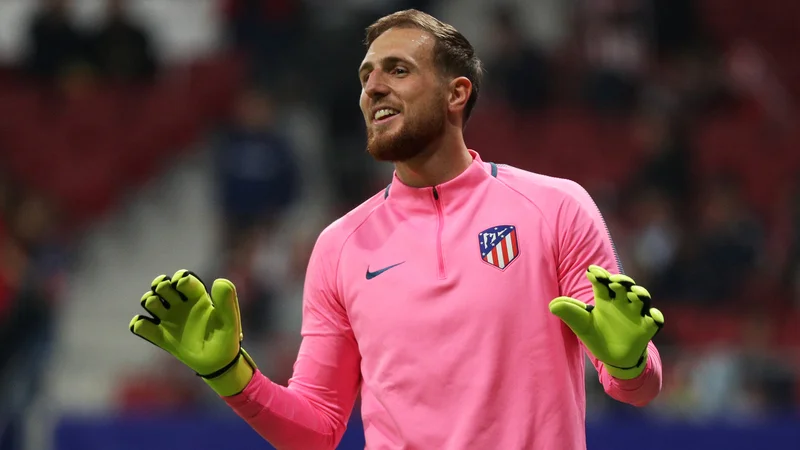 Fotografija: Jan Oblak bo poskušal ustaviti napade madridskega Reala. FOTO: Reuters