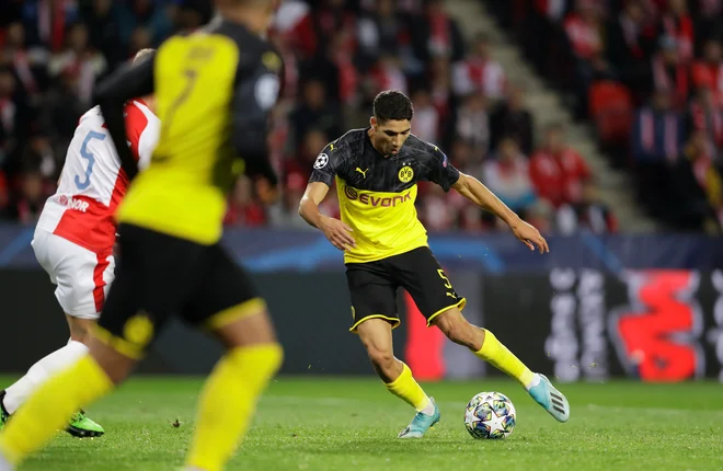 Realov otrok in maroški reprezentant Achraf Hakimi je bil junak Borussie Dortmund v Pragi. FOTO: Reuters