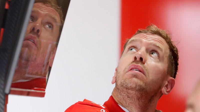 Fotografija: Sebastian Vettel je na včerajšnjih prostih treningih v Suzuki zasedel tretje in peto mesto. FOTO: Reuters