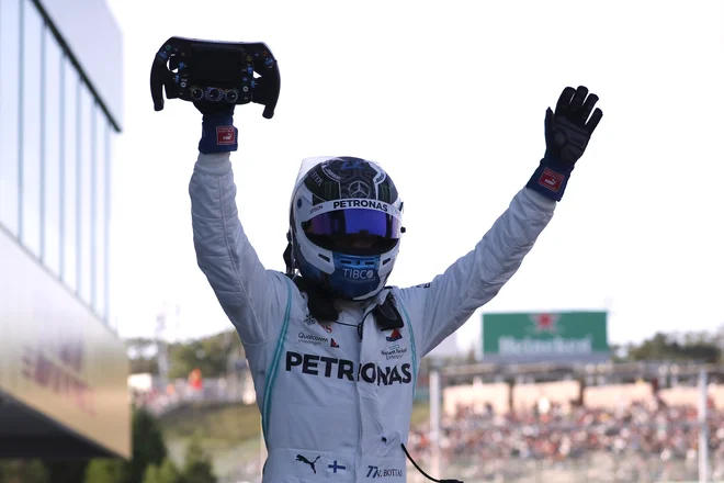 Valtteri Bottas se je veselil zmage na Japonskem. FOTO: Reuters