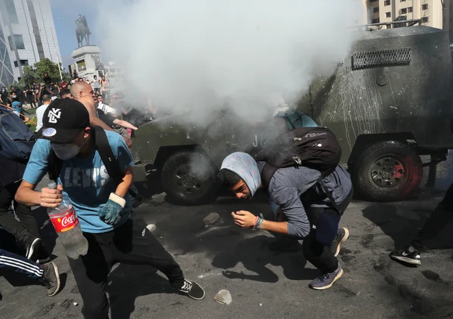 Policisti so po vsej državi pridržali več kot 1400 ljudi. FOTO: Ivan Alvarado/Reuters
