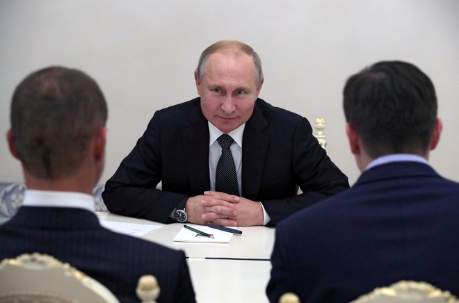 Aleksander Čeferin se je v St. Peterburgu pred kratkim srečal z ruskim predsednikom Vladimirjem Putinom. FOTO: Reuters