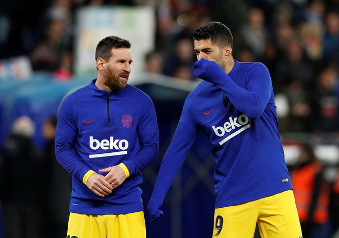 Lionel Messi in Luis Suarez sta bila tudi v derbiju z Espanyolom med vidnejšimi igralci Barcelone. Slednji je prispeval gol in podajo za končnih 2:2. FOTO: Reuters