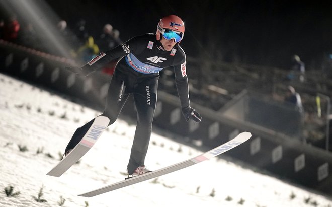 Dawid Kubacki s svojimi včerajšnjimi skoki ni bil najbolj zadovoljen. FOTO: AFP
