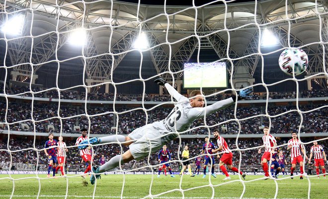 Pri strelu in golu Lionela Messija Škofjeločan ni imel možnosti. FOTO: Reuters