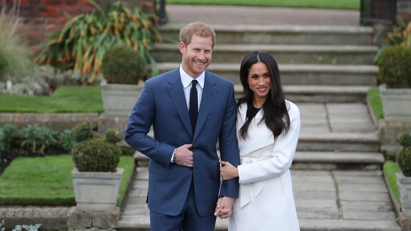 Fotografija: Princ Harry in njegova žena Meghan sta v sredo zvečer objavila, da se odrekata statusu »višjih članov kraljeve družine«. FOTO: Daniel Leal-olivas/Afp