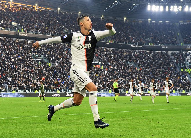Cristiano Ronaldo bo v nedeljo zvečer del derbija italijanskega prvenstva v Rimu. FOTO: Reuters