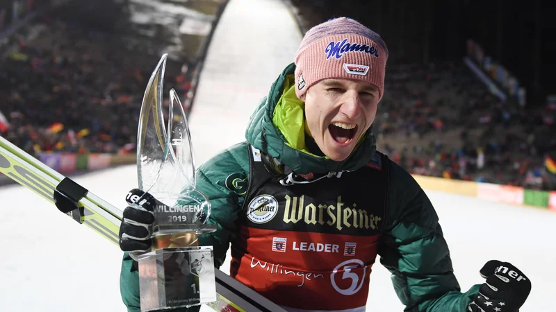 Karl Geiger je v Predazzu prevzel vodstvo v skupni razvrstitvi za svetovni pokal. FOTO: AFP