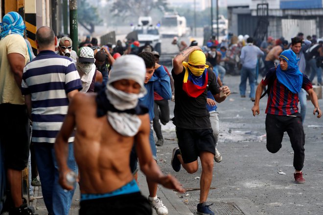Leto 2019 so Venezuelo pretresali številni protesti. FOTO: Reuters