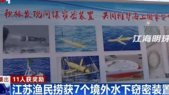 Kitajska nacionalna televizija je objavila prispevek o ujetih tujih podvodnih dronih in o nagradah ribičem, ki so jih ujeli. FOTO: Posnetek Zaslona/ Kitajska Nacionalna TV