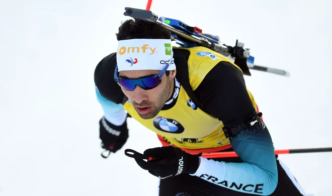 Francoski biatlonec Martin Fourcade je v tej sezoni zmagal že tretjič zapored. FOTO: AFP