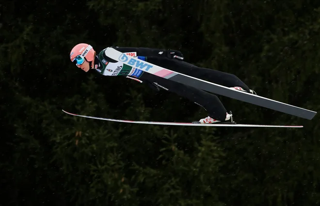 Zmagovalec novoletne turneje Dawid Kubacki. FOTO: Wolfgang Rattay/Reuters