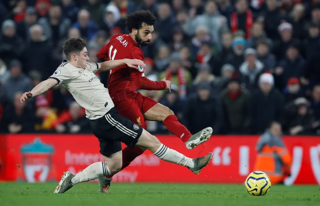Mohamed Salah je postavil piko na i velikega derbija. FOTO: Reuters