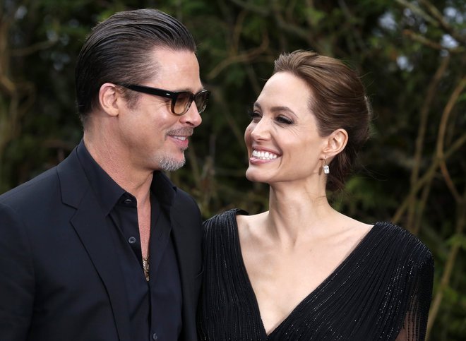 Brad Pitt in Angelina Jolie imata skupaj šest otrok, tri biološke in tri posvojene. FOTO: Reuters
