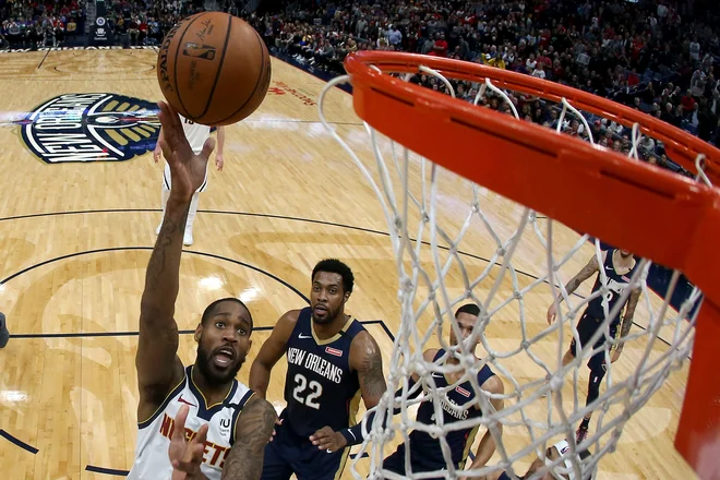Zadetek Willa Bartona iz moštva Denver Nuggets. FOTO: AFP