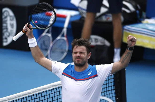 Švicarski veteran <strong>Stanislas Wawrinka</strong> je po dobrih treh urah premagal enajst let maljšega tekmeca. FOTO: Reuters