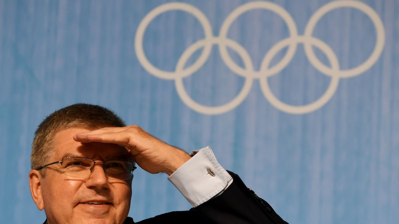 Fotografija: Predsednik MOK Thomas Bach je sporočil, da bodo iz kitajske prestavili številne kvalifikacijske turnirje za olimpijske igre v Tokiu. FOTO: AFP