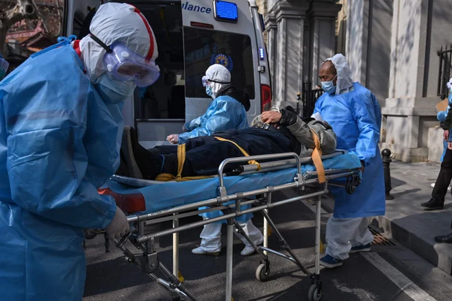 Koronavirus je do zdaj okužil že blizu 8000, usmrtil pa več kot 170 ljudi: Foto: Hector Retamal/Afp