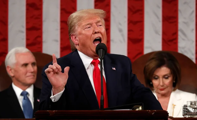Predsednik Donald Trump med nastopom v kongresu. FOTO: Leah Millis/AFP