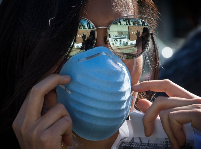 Kitajske oblasti so se šele v zadnjem času jasno spopadle z epidemijo. FOTO: Mark Ralston/Afp