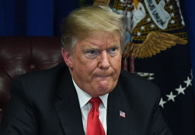 Donald Trump ne verjamem v podnebne spremembe. FOTO: Jim Watson/AFP