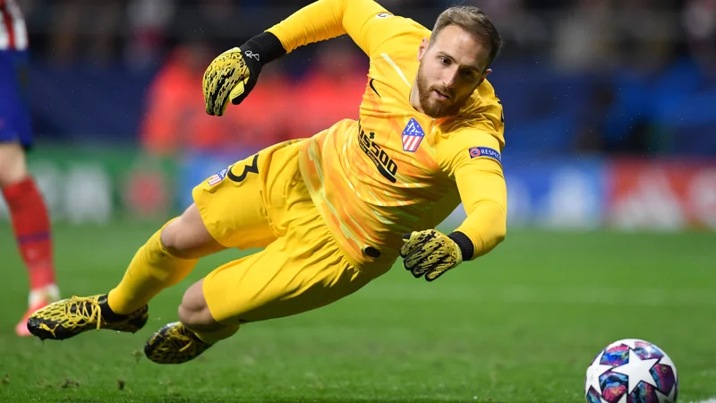 Fotografija: Jan Oblak se je skupaj s soigralci pri Atleticu veselil pomembne zmage nad Liverpoolom. FOTO: AFP