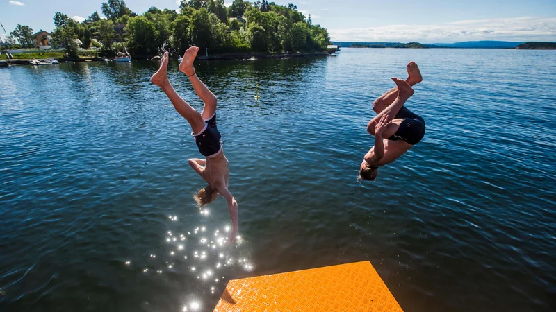 Fotografija: Skoraj zanesljivo bo letošnje poletje med petimi najtoplejšimi v zadnjih 60 letih, najbolj verjetno drugo najtoplejše. FOTO: Trond Reidar Teigen/AFP