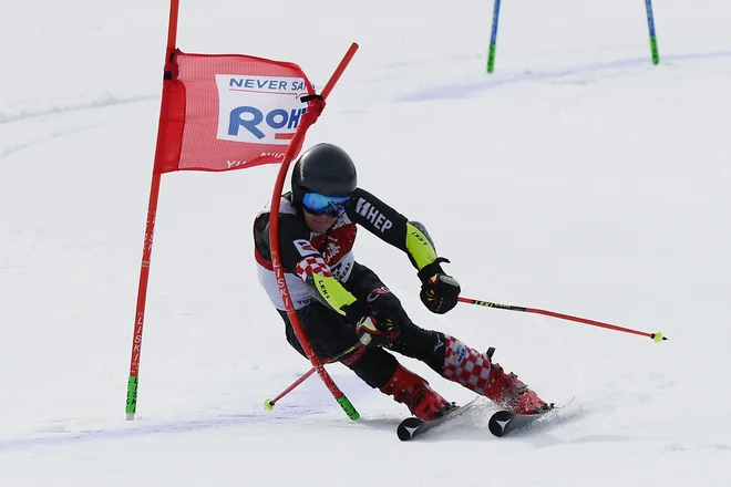 V spomladanskih razmerah je do prve zmage v karieri prišel Hrvat Filip Zubčić. FOTO: AFP