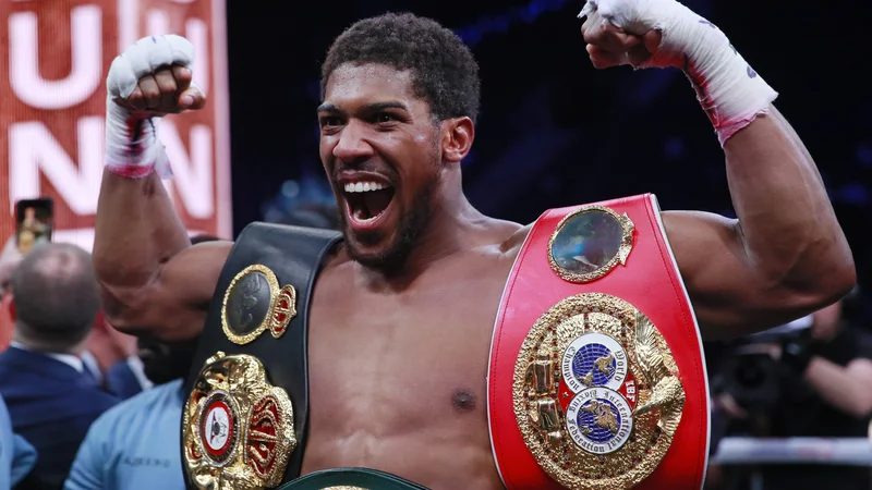 Fotografija: Anthony Joshua se svojim šampionskim pasovom zlepa ne namerava odpovedati. FOTO: Reuters