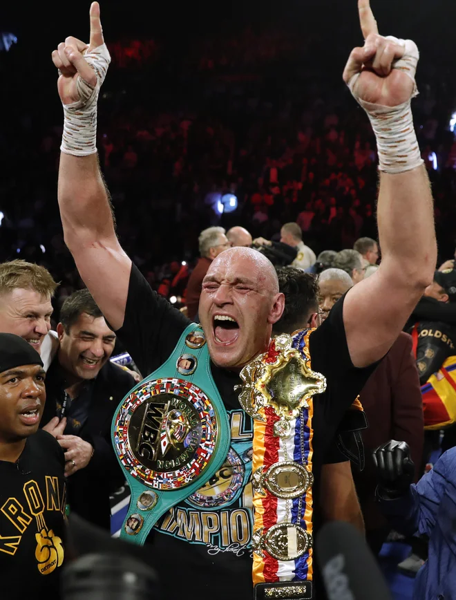 Tyson Fury je novi svetovni prvak v težki kategoriji po različici WBC. FOTO: Reuters