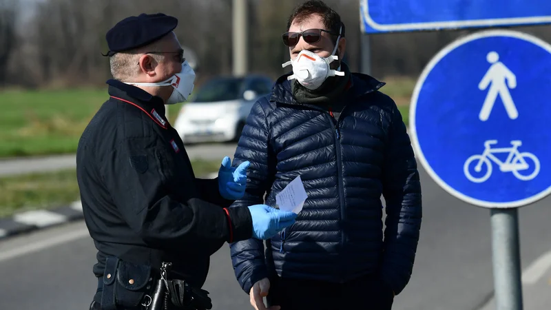 Fotografija: Novi koronavirus je v Italiji doslej zahteval pet življenj. FOTO:  Miguel Medina/AFP