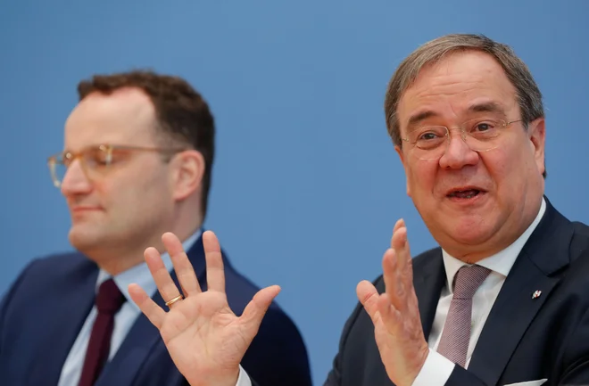 Jens Spahn in Armin Laschet na tiskovni konferenci. Foto: Odd Andersen/Afp