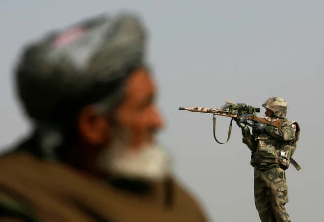 ZDA in talibi so se v Dohi pogajali od leta 2018. FOTO: Ahmad Masood/Reuters