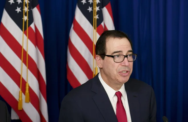 V četrtek je svojo udeležbo na investicijski konferenci Davos v puščavi odpovedal tudi ameriški finančni minister Steven Mnuchin. FOTO: Victor R. Caivano/Ap