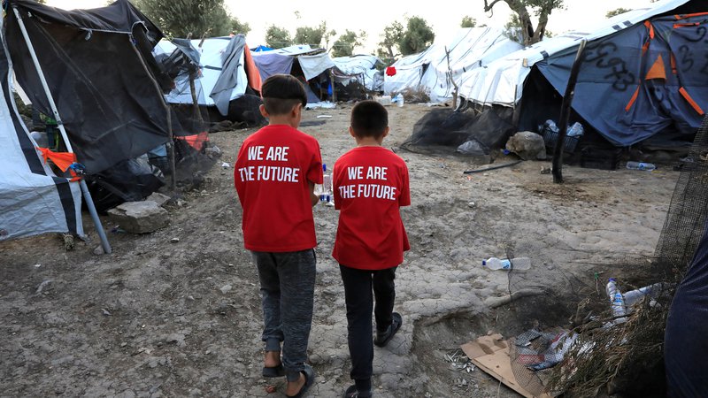 Fotografija: Midva sva prihodnost. FOTO: Giorgos Moutafis/Reuters