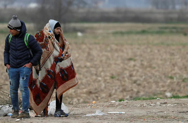 Migranta na grško-turški meji. FOTO: Murad Sezer/Reuters