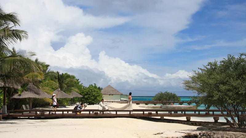 Fotografija: Na Maldivih zavračajo potnike, ki prihajajo z italijanskih letališč. FOTO: John Goh/Reuters