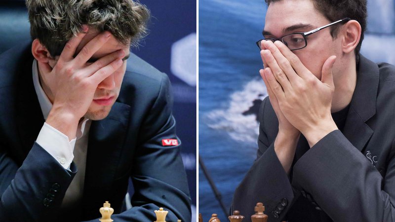 Fotografija: Kdo bo prvak, Magnus Carlsen (levo) ali Fabiano Caruana? FOTO: Koen Suyk/Afp