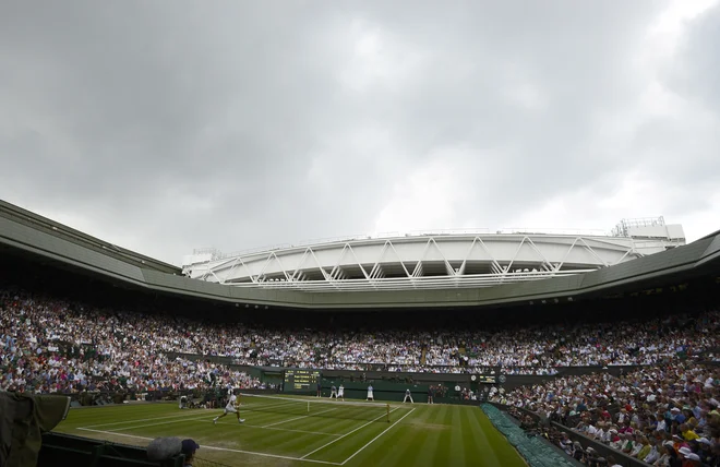 Začetek poletja si je v Londonu težko predstavljati brez slovitega teniškega turnirja. FOTO: Reuters