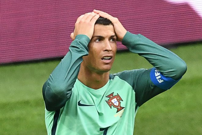Cristiana Ronalda in evropskega prvaka Portugalske konec maja ne bo v Stožicah. FOTO: AFP