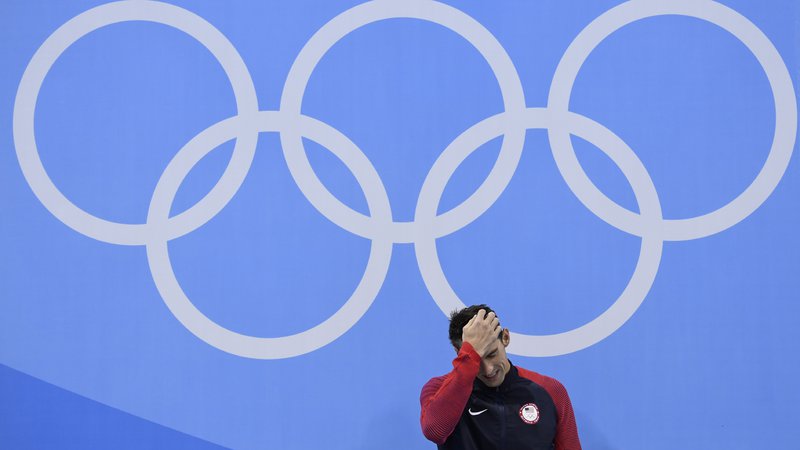 Fotografija: Michael Phelps je s fantastičnimi uspehi postal ikona petih olimpijskih krogov, a plačal visoko ceno. FOTO: AFP