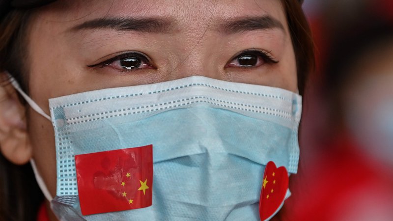 Fotografija: Veselimo se z Wuhanom, da je za njegove prebivalce najhuje minilo. FOTO: AFP