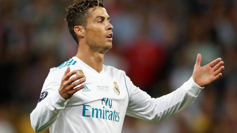Fotografija: 33-letni Ronaldo je priznal utajo davkov. FOTO: Andrew Boyers/Reuters