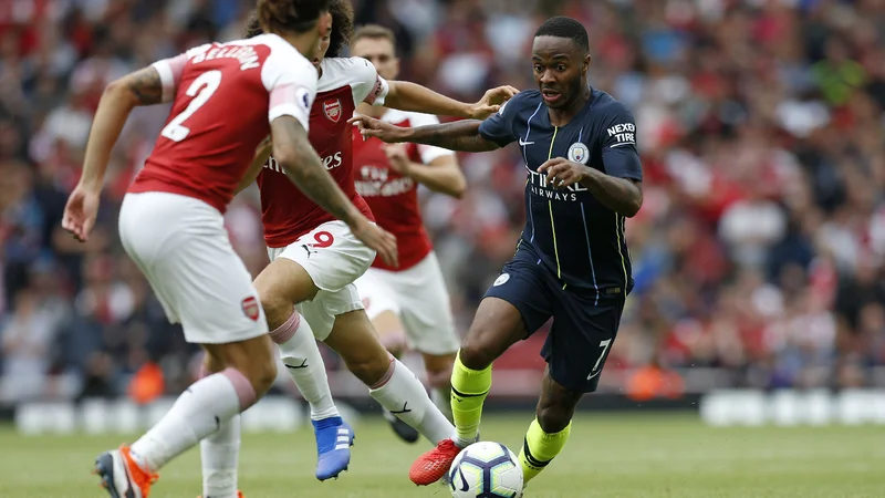 Fotografija: Raheem Sterling je povzročal težave Arsenalovi obrambi. Foto: AFP